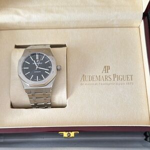 Audemars P Silver and Black Timepiece